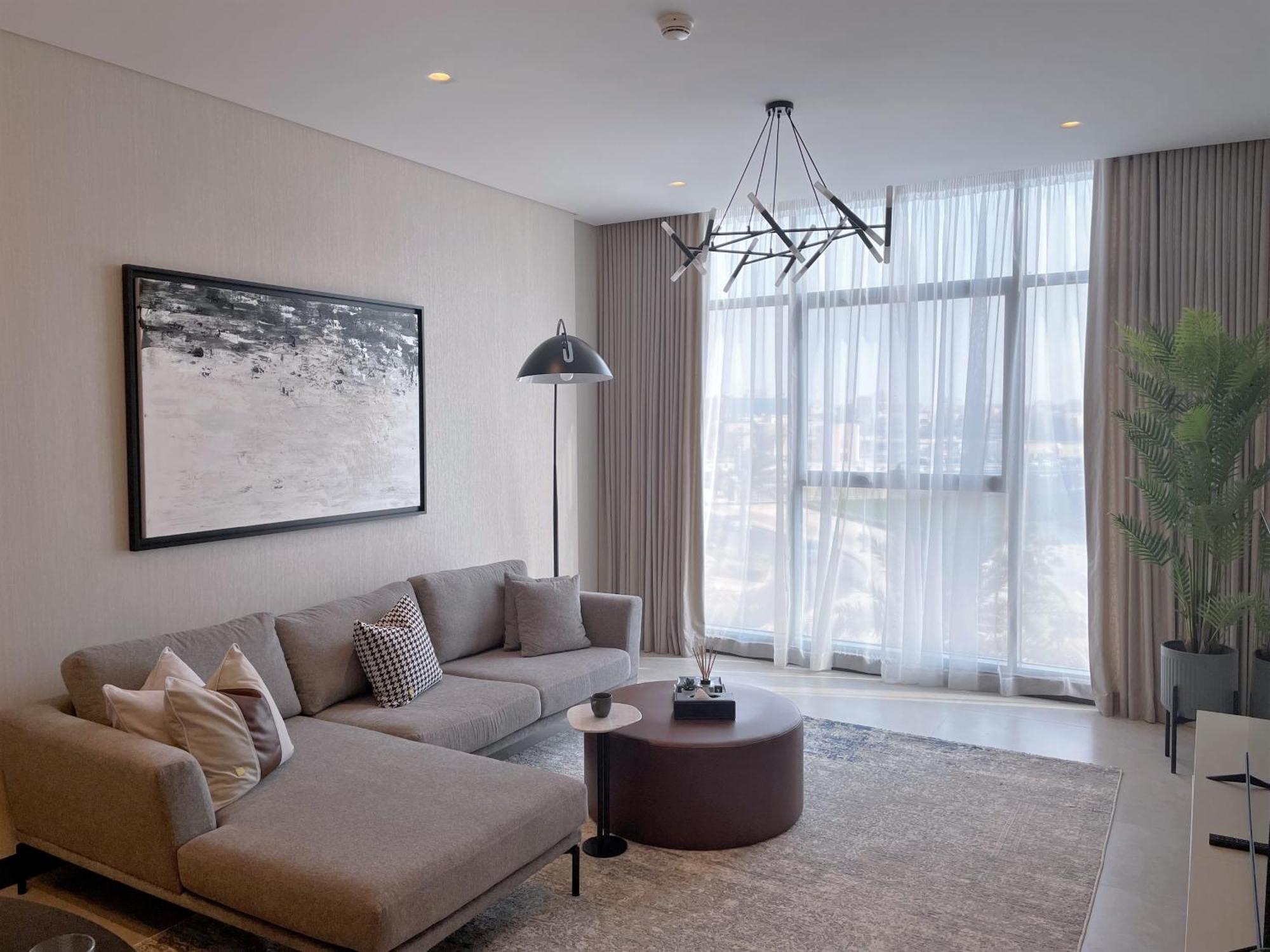 Charthouse Bahrain Hotel Manama Exterior photo A living room in a typical apartment